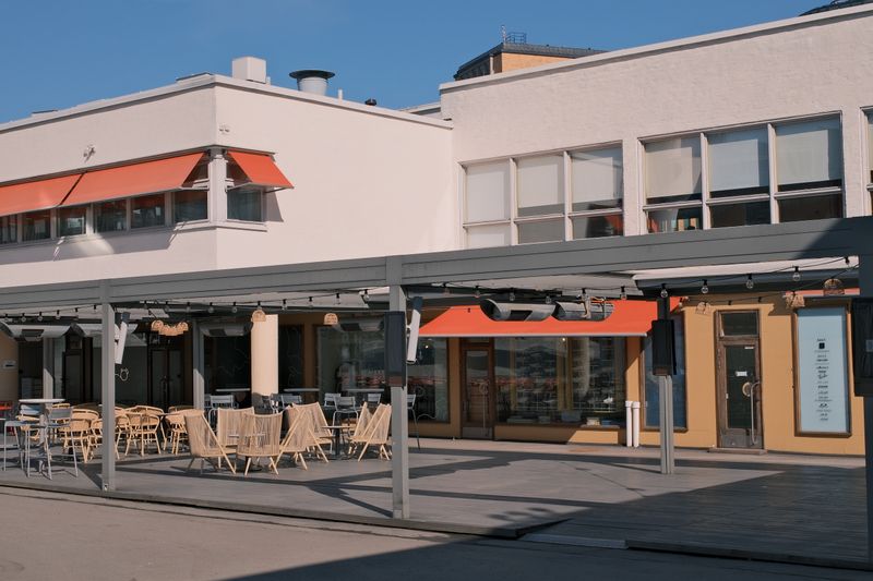 Outdoor patio seating area of Starbird chicken restaurant